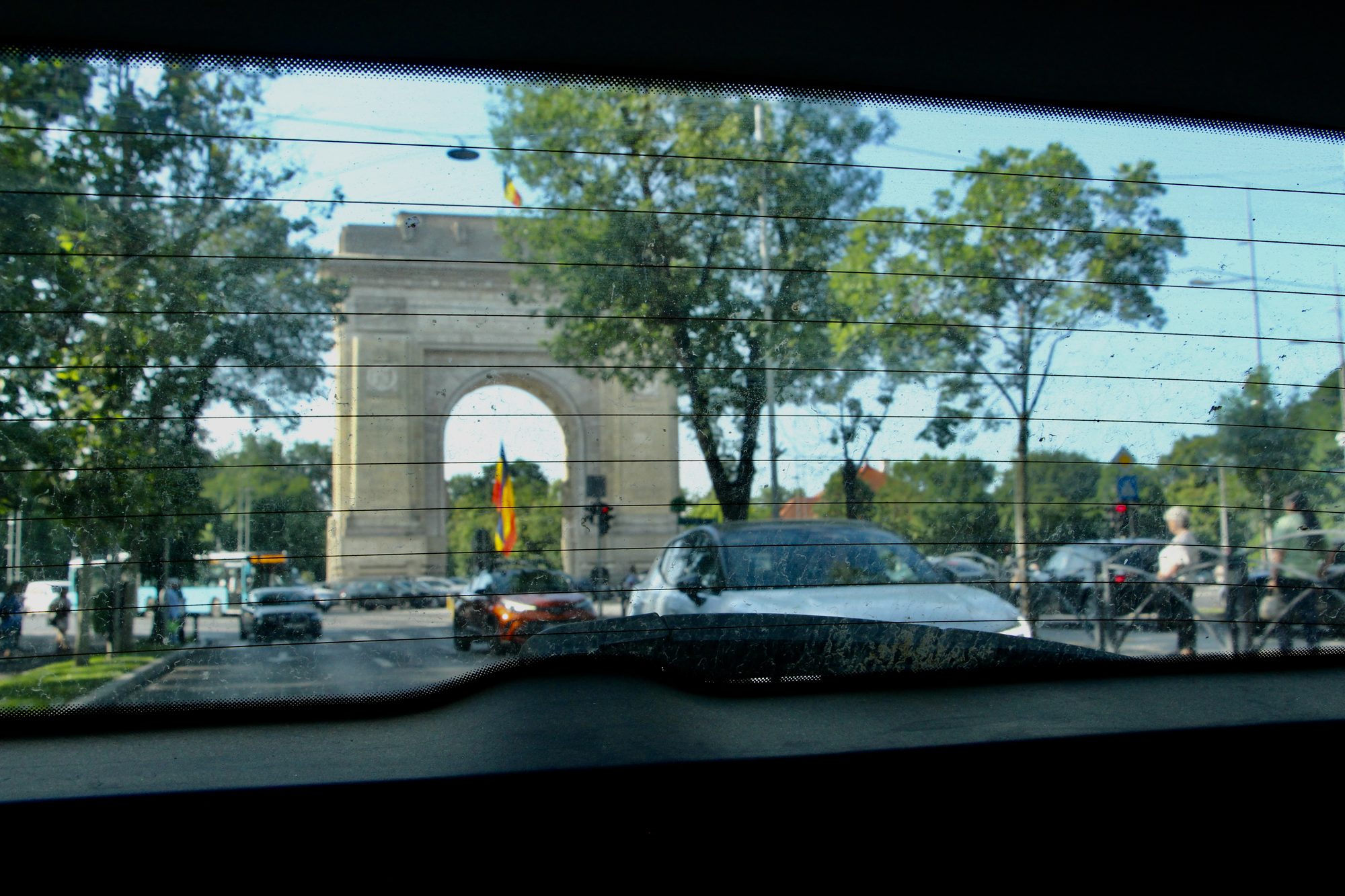 A view caught through a windscreen, an ordinary moment framed from an unexpected angle.